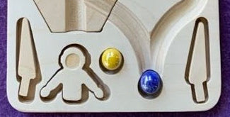 The Oort Run: A Marble Run Puzzle Game
