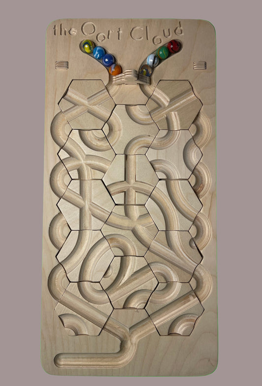 The Oort Cloud: A Marble Run Puzzle Game