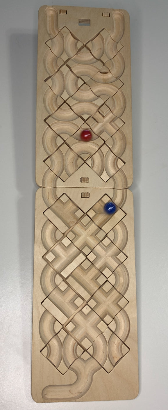 The Oort Cloud: A Marble Run Puzzle Game