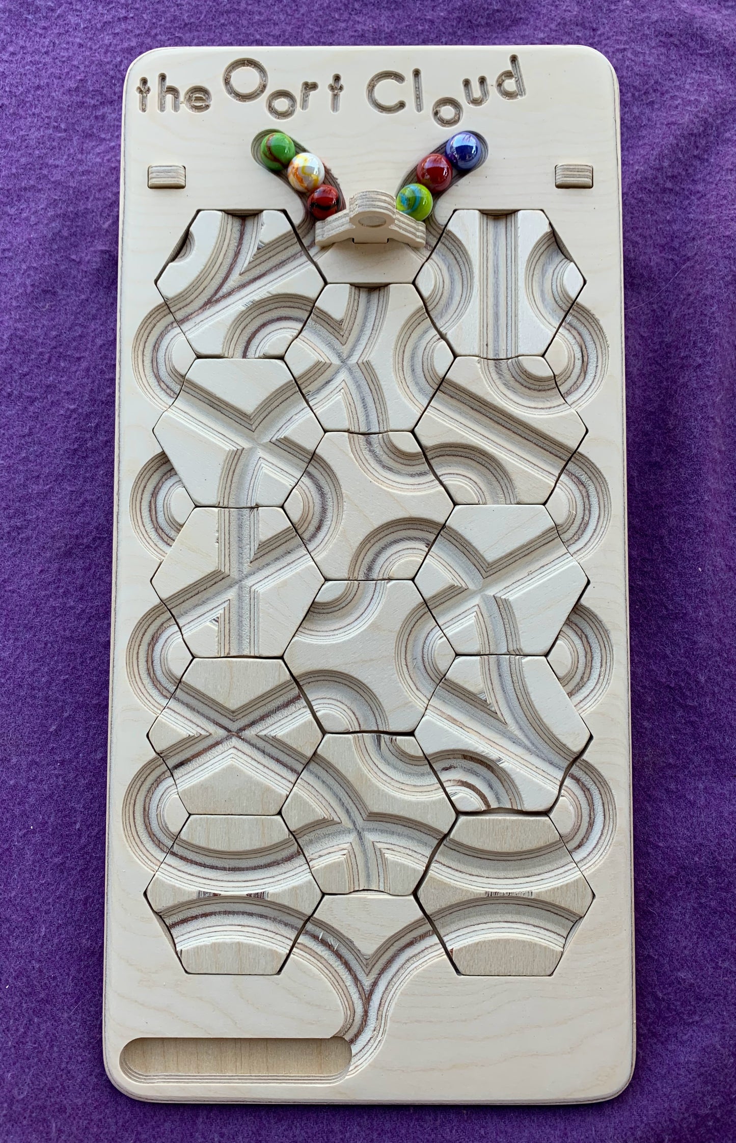 The Oort Cloud: A Marble Run Puzzle Game