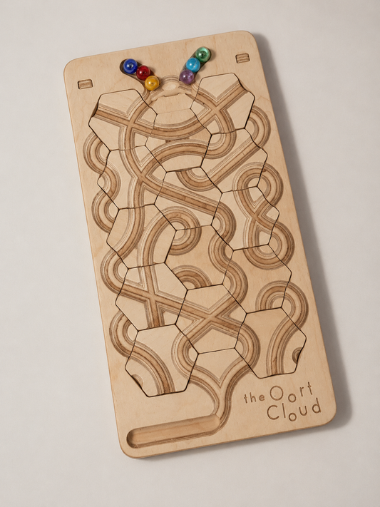 The Oort Cloud: A Marble Run Puzzle Game